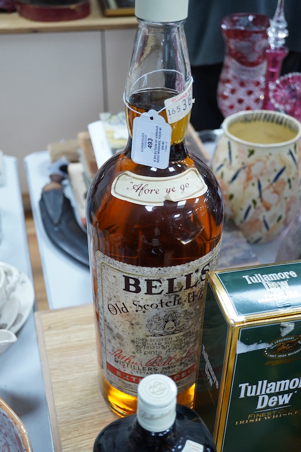 Ten bottles of Whisky including a gallon bottle of Bells. , Condition - good